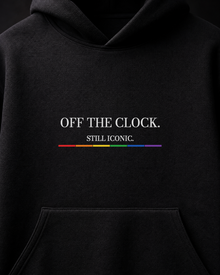 FÆBRIQ Off The Clock. Still Iconic. Heavyweight Hoodie — macro view showing the white print and six-stripe Pride Circuit bar.