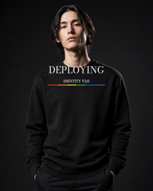 FÆBRIQ Deploying Identity v2.0 Heavyweight Crewneck — three-quarter on-model view showing the white chest print and six-stripe Pride Circuit bar.