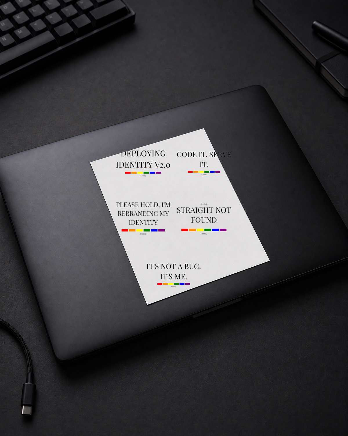 FÆBRIQ Sticker Sheet — The Full Drop — laptop-lid view showing the sheet and five typographic sticker designs.