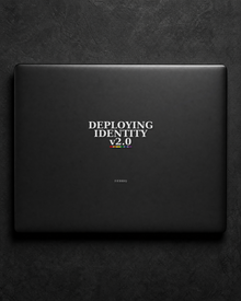 Deploying Identity v2.0 sticker centered on a black laptop lid.
