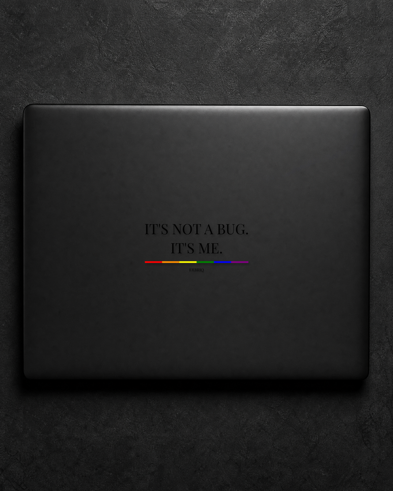It's Not A Bug. It's Me. sticker centered on a black laptop lid.